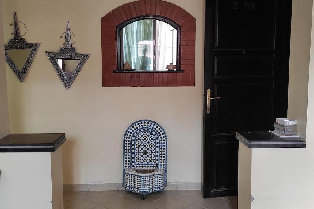 Charmant Appartement Dans Un Quartier Chic Et Calme マラケシュ エクステリア 写真